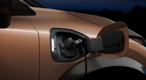 Close-up image of charging cable plugged in | Harbor Nissan in Port Charlotte FL