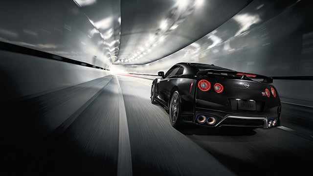 2023 Nissan GT-R seen from behind driving through a tunnel | Harbor Nissan in Port Charlotte FL